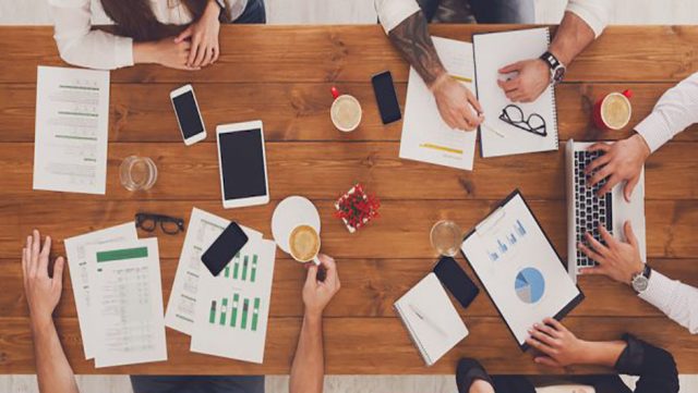 4 market growth resources people working at a table