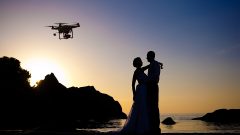 Drone capturing wedding photographs