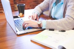 Website Woman working on a laptop