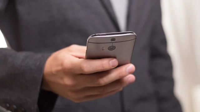 person holding cell phone
