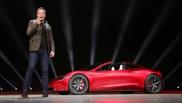 Elon Musk with the Tesla Roadster