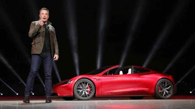 Elon Musk with the Tesla Roadster