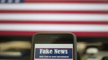 Phone fake news american flag