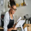 restaurant owner managing inventory ipad pos