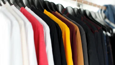 shirts hanging from a rack
