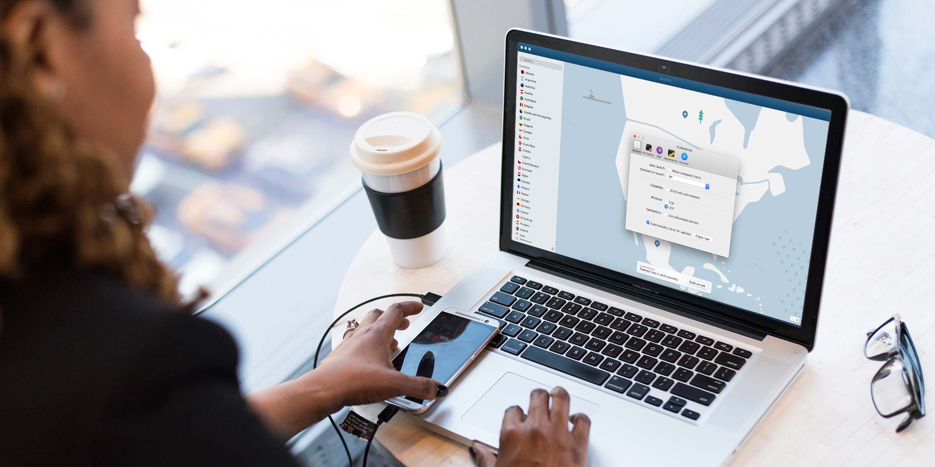 woman accessing vpn on a laptop in an office