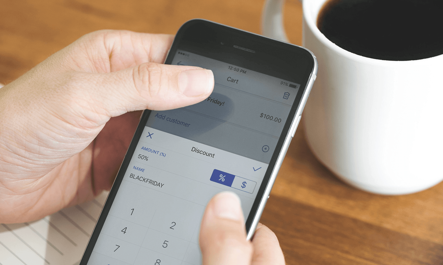 person setting shopify discount via app