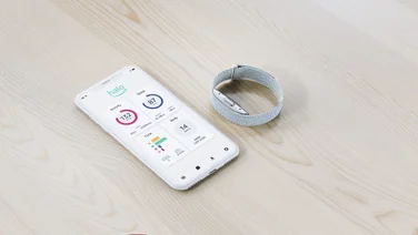 Amazon Halo Band and app on table