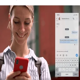 An 8x8 user looking at their mobile device