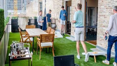 startup workers playing games and drinking
