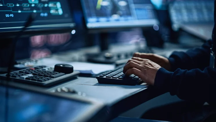 picture of boss monitoring employees