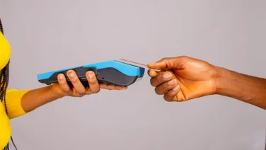 Person paying by card