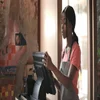 Employee using a POS system