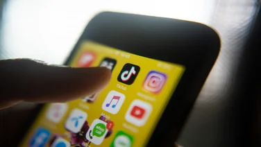 TikTok logo on smartphone