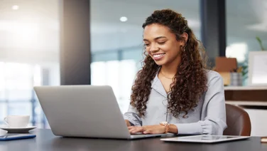 Women using a laptop at her desk