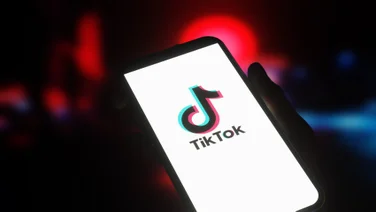 TikTok logo on phone