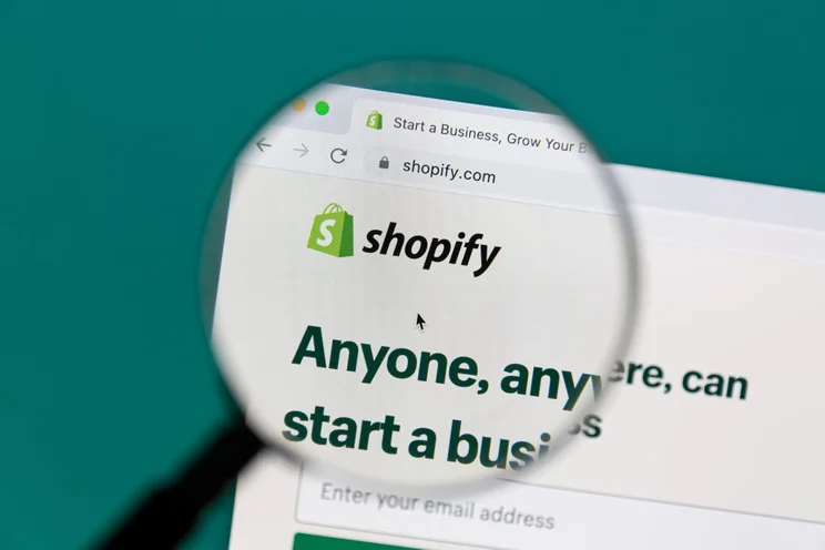 Shopify logo under a microscope