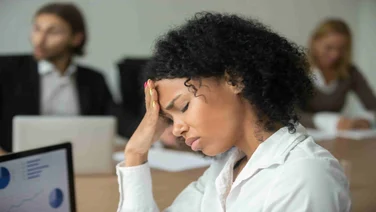 Woman burnt out at work