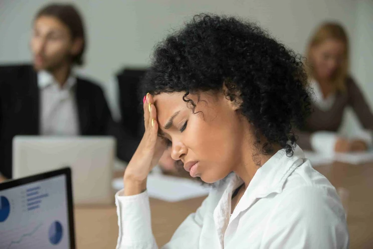 Woman burnt out at work