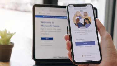 Microsoft Teams on both a smartphone and laptop