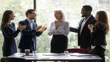 Employee being congratulated