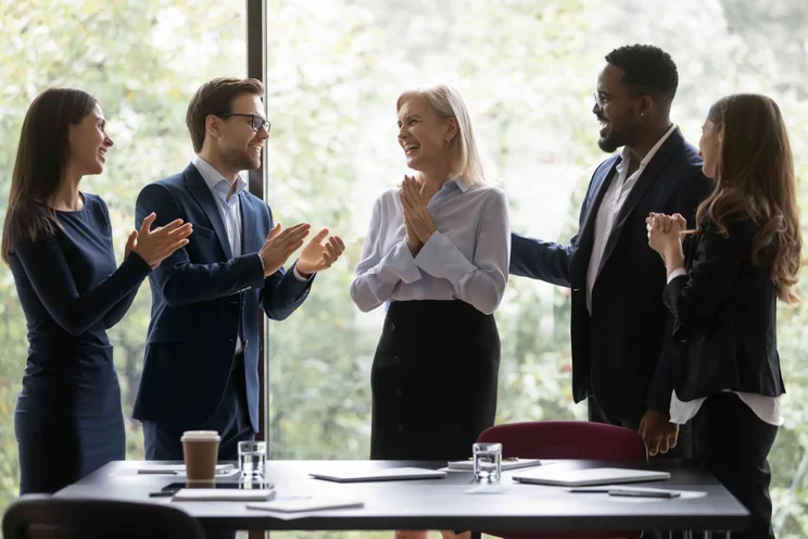 Employee being congratulated