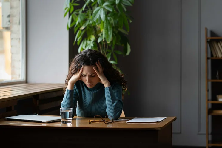 Young worker experiencing burnout