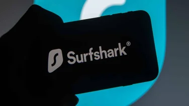 Surfshark logo on phone