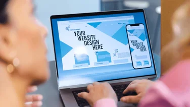 Two people build a website from scratch. Source: Tech.co