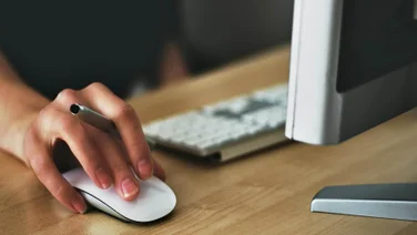 A mouse and desktop in use