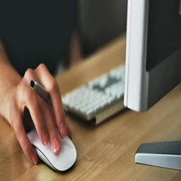 A mouse and desktop in use