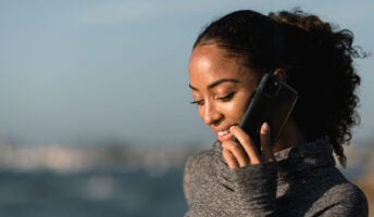 A woman calls on a smartphone