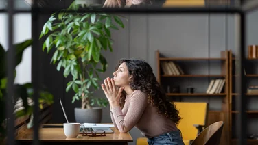 Disengaged worker at her desk