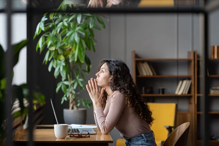 Disengaged worker at her desk