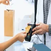 Pharmacist taking a payment
