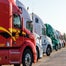 Semi-trucks, parked in a row