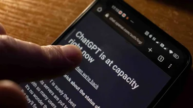 chatgpt on phone at capacity