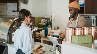 A customer uses a pos system
