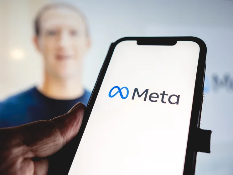 Meta phone screen and Mark Zuckerberg