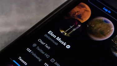 Musk account on phone screen
