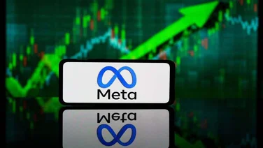 Meta logo in front of green arrow