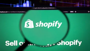 Shopify logo under magnifying glass