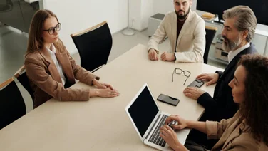A business meeting for hiring a new employee.