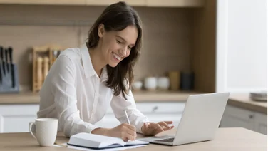 Woman sat at desk with laptop