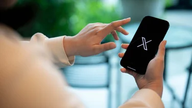 X logo on an iphone