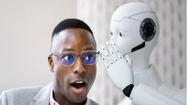 robot whispering to man
