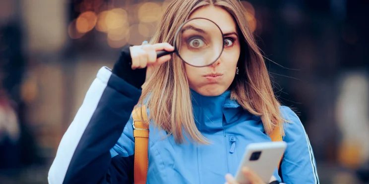 Woman Searching the Internet on her mobile Phone