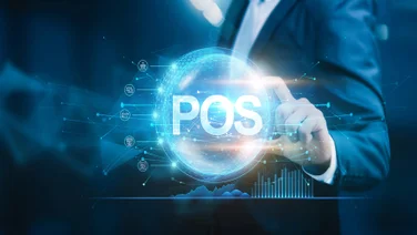Businessman with finger on circle illustrating POS data analysis concept