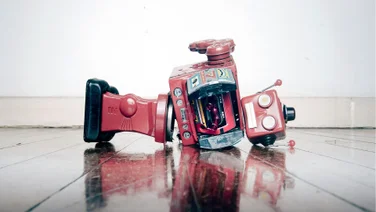 broken robot laying on its side