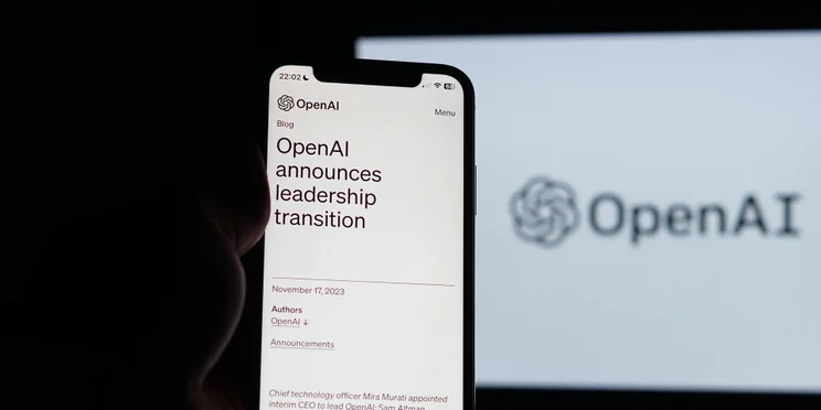 OpenAI leadership change on smartphone screen after Sam Altman was fired